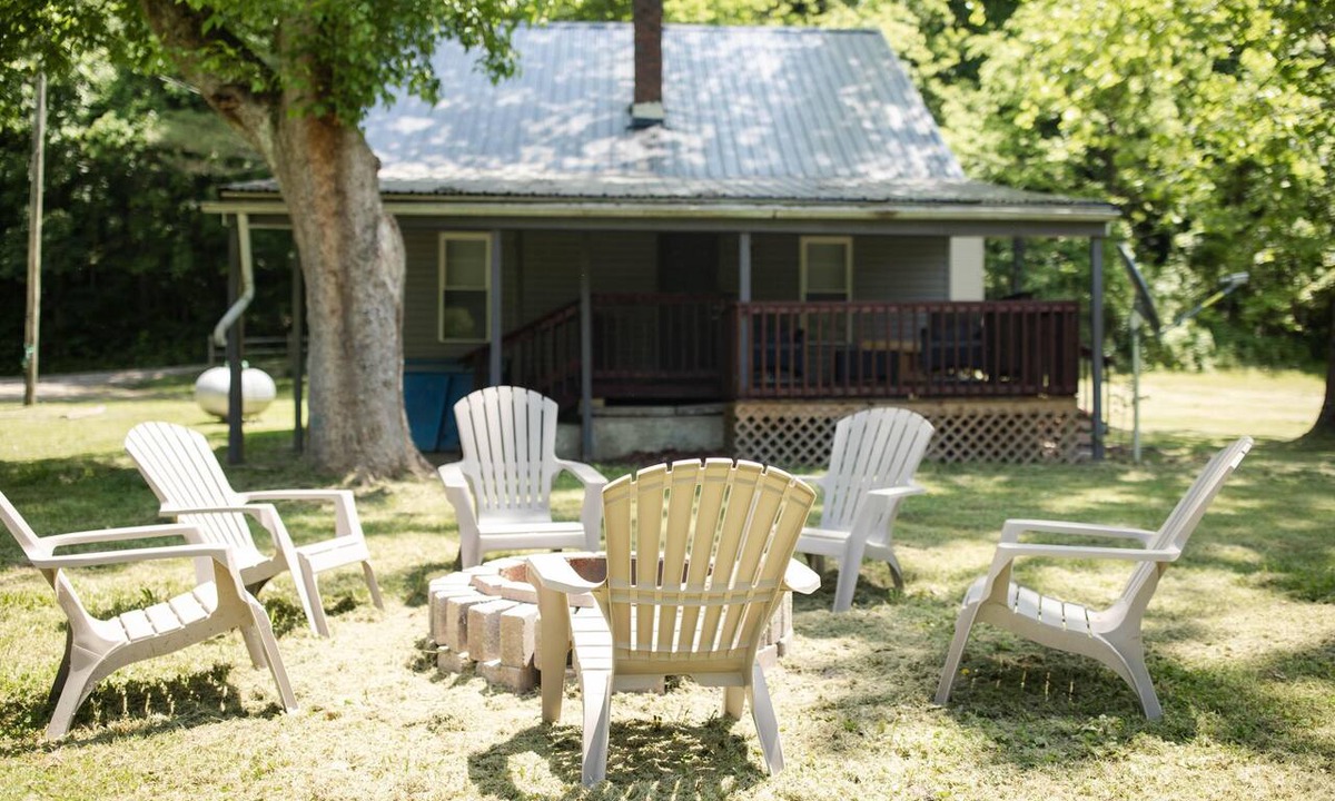 Sharpsburg House | 9511 Compressor Rd, Chesterhill, OH - Outdoor Movie Theater with Outdoor Kitchen and Games