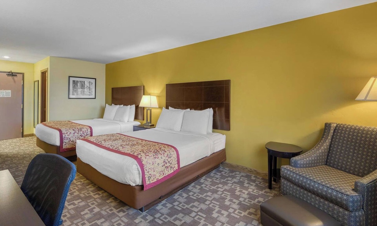 Blackfoot Hotel | Double Queen Family Room | Complimentary Hot Breakfast & Indoor Heated Pool