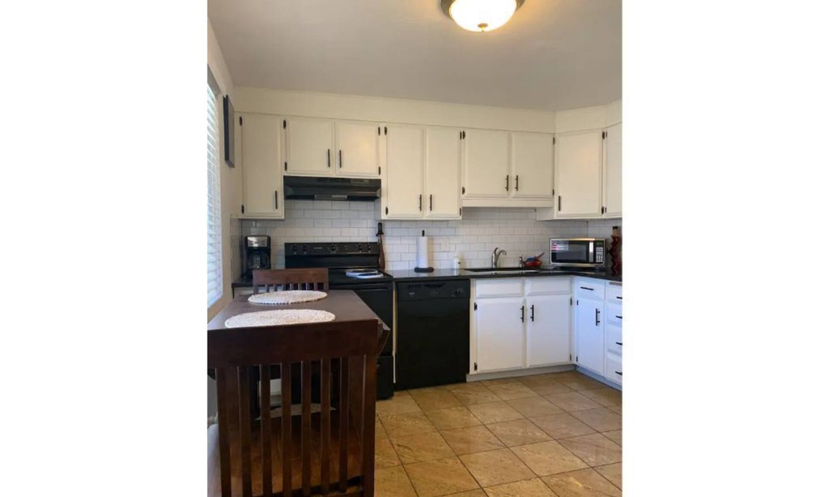 Washington Terrace House | Lovely 2 bedroom with free private carport parking and private patio