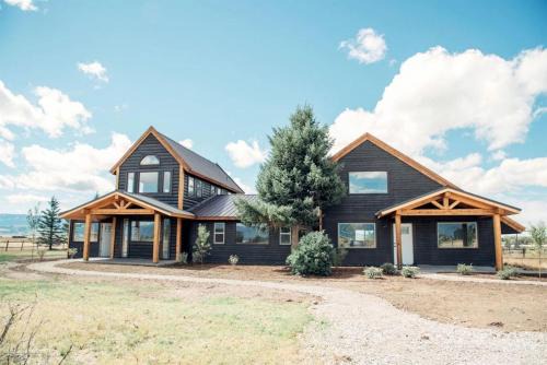 Tetonia House | Spacious Farmhouse Estate with Mountain Views & Dual Kitchens near Skiing and Trails in Tetonia, Idaho