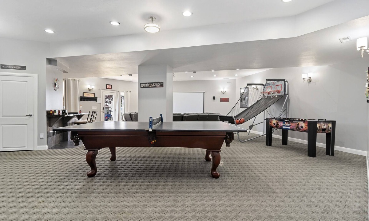 North Ogden Apartment | The Rec Room is a basement apartment with game tables, theater, hot tub & more!