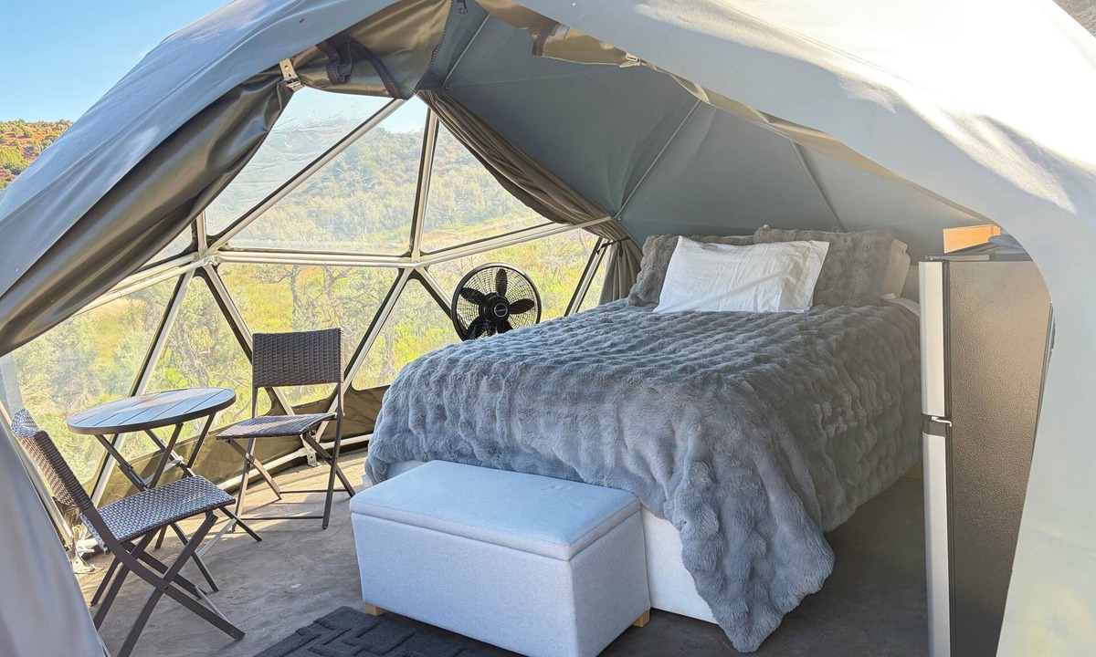 Laketown RV Rental | Unplug and unwind in our secluded off-grid glamping dome, nestled by a private lake. Enjoy the peace and quiet with all the comforts of home
