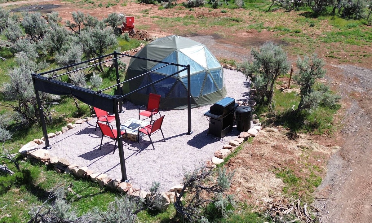Laketown RV Rental | Unplug and unwind in our secluded off-grid glamping dome, nestled by a private lake. Enjoy the peace and quiet with all the comforts of home.