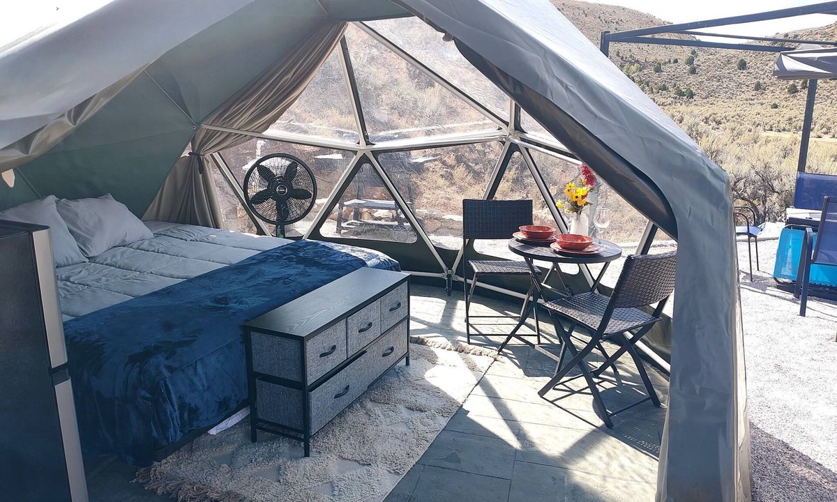 Laketown RV Rental | Unplug and unwind in our secluded off-grid glamping dome, nestled by a private lake. Enjoy the peace and quiet with all the comforts of home.
