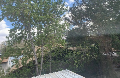 Millcreek House | 3-bedroom residential duplex with carport.