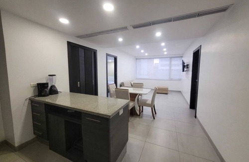 Bouvet Island Apartment | Airport-Ready 2BR Gem by Mall del Sol AC + Fitness + Fast WiFi