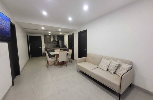 Bouvet Island Apartment | Airport-Ready 2BR Gem by Mall del Sol AC + Fitness + Fast WiFi