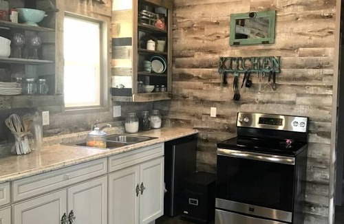 Irwin Cabin | Beautiful Tiny House with Wrap-Around Deck and Skylight for a Romantic Escape in Irwin, Idaho