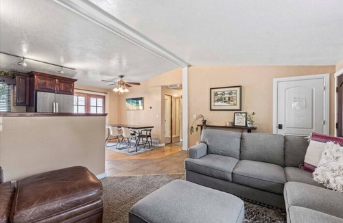 Millcreek House | Charming Mountain Retreat with Enclosed Backyard and Artistic Flair