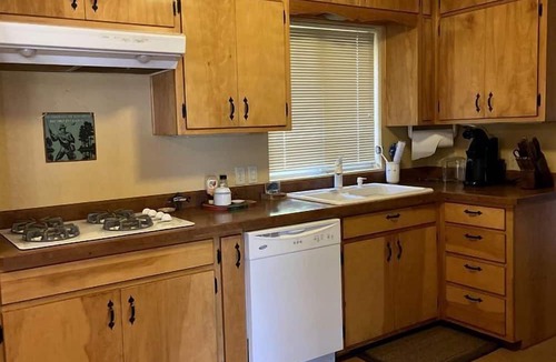 Ennis House | Charming Riverside Vacation Rental with Scenic Mountain Views near Ennis, Montana