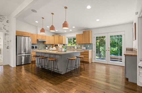 Husum House | Dog-Friendly Creekside Home w/Hot Tub, Game Room. 15 minutes to town