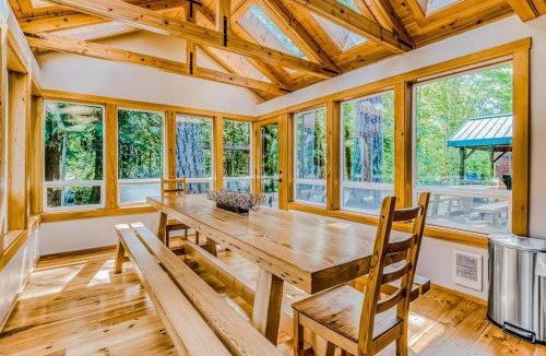 Mount Hood Village House | Dog-friendly creekside home with entertainment barn private hot tub & firepit