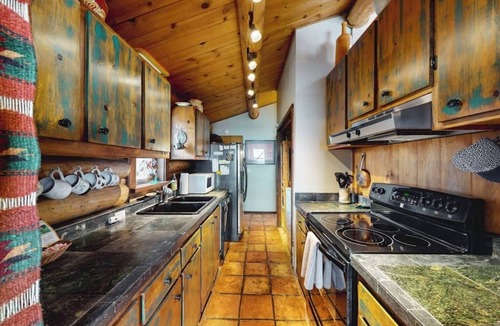 Jackson Cabin | Dog-friendly waterfront cabin on Flat Creek with wood stove, creek view, firepit