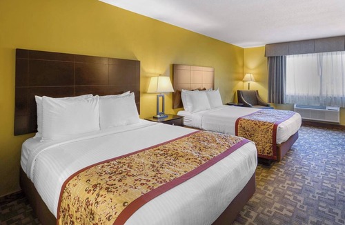 Blackfoot Hotel | Double Queen Family Room | Complimentary Hot Breakfast & Indoor Heated Pool