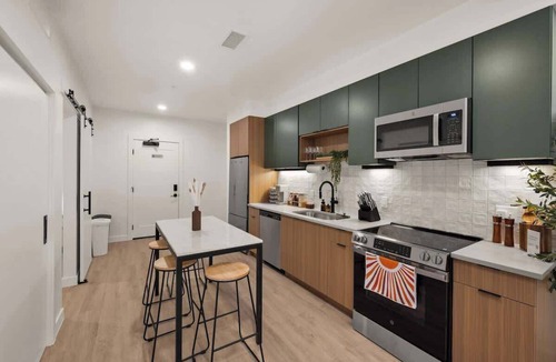 People's Freeway Apartment | Downtown Salt Lake City Modern Retreat - Views + Pool + Sauna