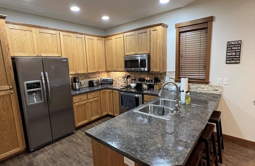 Lynden House | Duplex with A/C on quiet street close to dining, shopping, hospitals & mountains