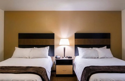 Dickinson Hotel | Extra Space, Extra Fun – 2 Full Beds Suite Perfect for Families & Weekend Escape