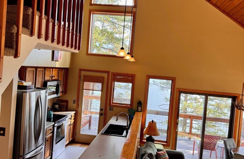Finley Point Cottage | Finley Point Lakefront Cottage with Dock, Boat Lift, and Treehouse Balcony
