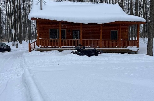 Elmira Cabin | Lakes of the North Cabin near trails - Access to Clubhouse with Pool and Hot Tub