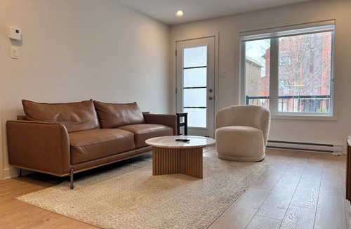 Longueuil Condo | Modern condo by Boisé du Tremblay with parking and fitness equipments