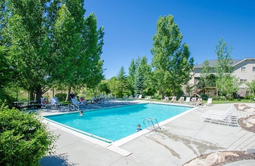 Wolf Creek House | Mountain Lion Outpost: Spacious 4BR townhome in Eden, UT, perfect for family retreats.