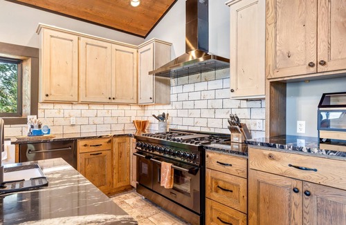Gallatin Gateway House | NEW! Soak, Play, Unwind: Secluded Big Sky Lodge with Dual Hot Tubs and Game Room