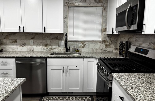 Murray House | Newly remodeled home on a quiet street with a large yard.