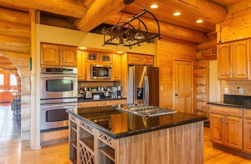 Garden Valley Cabin | ONE OF A KIND, PICTURESQUE, CEDAR LOG CABIN FOR THE WHOLE FAMILY