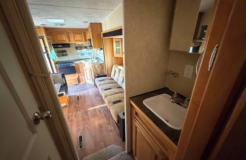Sheridan House | Outdoorsman's Paradise. RV with AC, Picnic table, fire pits, creek side dining.