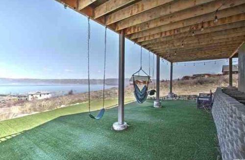 Harbor Village House | Putting green with hot tub, swings and spectacular views