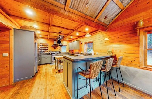 Sagle House | Rustic woodland home with hot tub, patios & fireplaces - near lake access