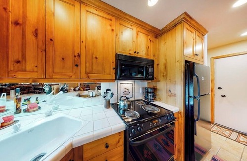Warm Springs Condo | Ski-in/ski-out condo with pool, mountain view, balcony, & easy trail access