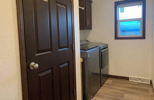 Powell House | Spacious 4-bedroom house in charming rural Powell with media and fitness room