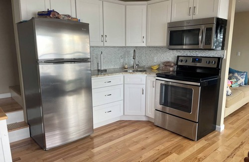 Pellston Cottage | Spacious 6-bedroom cottage, 15 ft from lake and 200 yds from Douglas Lake Bar