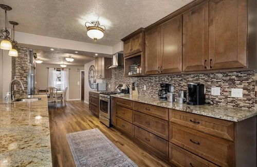 Cliff - Cannon House | Spokane South Hill entertainer’s haven w/theater, wine room & BBQ patio.