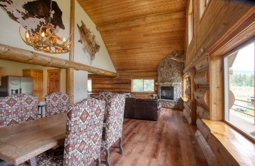 Bonner County Cabin | The Cabin · Rustic Log Cabin with Pasture and Mountain Views