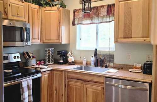 Coram Cabin | Themed Bear's Den Cabin nestled in the pines minutes outside of Glacier Park.