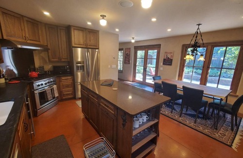 Bozeman House | This deluxe Spanish-style 4-bedroom home offers the best of Bozeman!