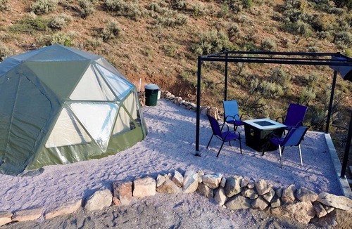 Laketown RV Rental | Unplug and unwind in our secluded off-grid glamping dome, nestled by a private lake. Enjoy the peace and quiet with all the comforts of home.