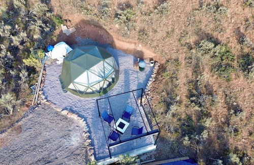 Laketown RV Rental | Unplug and unwind in our secluded off-grid glamping dome, nestled by a private lake. Enjoy the peace and quiet with all the comforts of home.