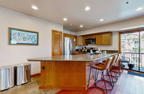North Park City Condo | Walk to lifts & Main St. condo with hot tub, heated garage, & mountain view