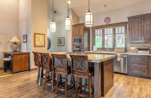 Lakeside House | Wilderness retreat with a large deck, grill, updated interior, fireplace, and AC