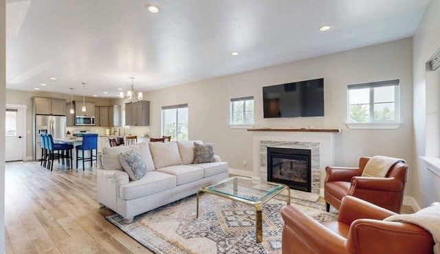 A charming, comfy townhome with patio views, cozy fireplace and more