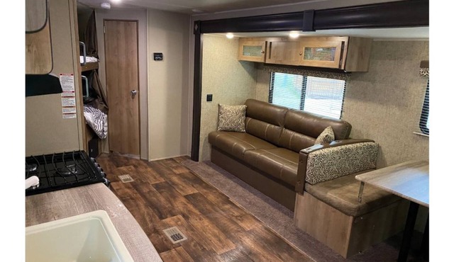 Amazing RV with bunks and enclosed Master