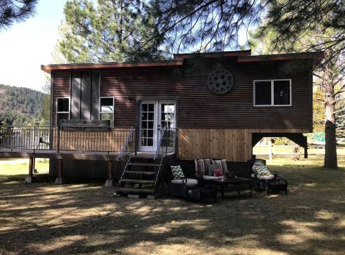 Beautiful Tiny House with Wrap-Around Deck and Skylight for a Romantic Escape in Irwin, Idaho