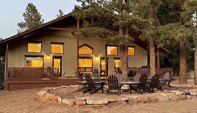 Large, luxury cabin, sleeps 19 with a gourmet kitchen, hot tub & fire pit in Angel Fire