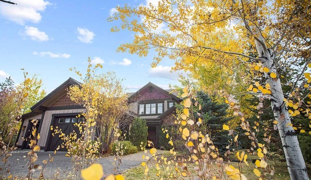 Lux 4 Season Retreat! River Lodge w/Outdoor Pool, Sauna, & Gym! High End Furnishings Throughout!