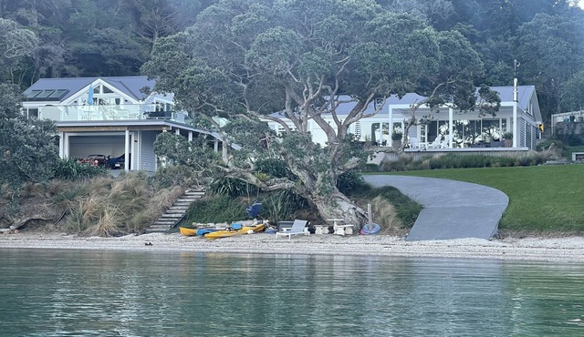 Private Beach front property in Paradise in Whangateau