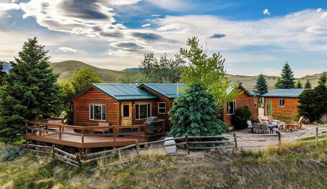 Quintessential Wyoming log cabin retreat near Bighorn National Forest, Lake DeSmet, Buffalo, Big Horn, and Sheridan. This charming main house comfortably sleeps 6 with a king bed, twin beds, and queen sleeper sofa. Pets welcome.