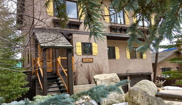 Rare main floor suite, with full kitchen and balcony mountain views. in Jasper